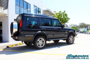 Rear right view of a Black Landrover Discovery 2 after fitment of a Tough Dog 35mm Lift Kit