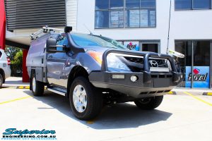 Right front side view of a Mazda BT50 Single Cab in Grey after fitment of New Superior Nitro Gas Front Struts and EFS Coil Springs