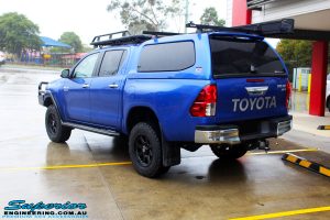 Rear left view of a Blue Toyota Revo Hilux Dual Cab after fitment of a EFS 40mm Lift Kit and Wheel/Tyre Package
