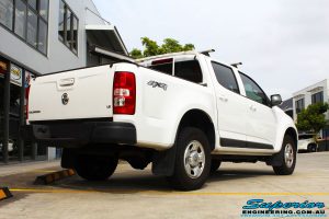 Rear right view of a White Holden RG Colorado Dual Cab before fitment of a Superior Nitro Gas 2" Inch Lift Kit, Rhino 4x4 Evolution Winch Bar, Ironman 4x4 Rear Protection Towbar + VRS Winch