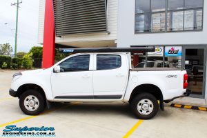 Left side view of a White Holden RG Colorado Dual Cab after fitment of a Superior Nitro Gas 2" Inch Lift Kit, Rhino 4x4 Evolution Winch Bar, Ironman 4x4 Rear Protection Towbar + VRS Winch