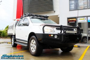 Right front side view of a White Holden Colorado RG before fitment of a Bilstein 45mm Lift Kit with King Coil Springs + Ironman 4x4 Snorkel