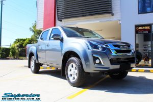 Right front side view of a Grey Isuzu D-Max Dual Cab before fitment of a Superior Nitro Gas 2" Inch Lift Kit, MCC Drawer System, MCC 4x4 Bullbar, Hayman Reece Towbar, MCC 4x4 Side Steps, EGR Premium Canopy, Rhino Roof Rack & a Ironman 4x4 Instant Awning with LED's