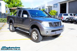 Right front side view of a Nissan D40 Navara Extra Cab after fitment of a Superior Nitro Gas 2" Inch Lift Kit