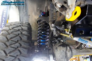 Front right shot of the passenger front suspension setup of the Superior 3" Remote Reservoir Front Shock with Coil Spring