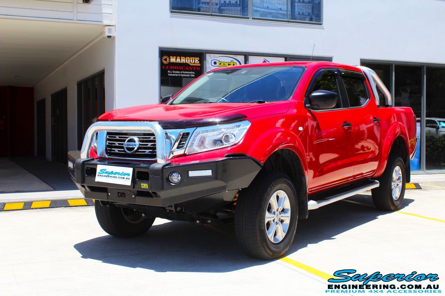 Right front side view of a Nissan NP300 Navara Dual Cab after fitment of a Superior Nitro Gas 2" Inch Lift Kit