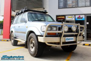 Right front side view of a Blue Marlin Toyota 80 Series Landcruiser Wagon before fitment of a Superior Nitro Gas 2" Inch Lift Kit, Superior Radius Arm Rear Bushes & Superior Swaybar Extensions