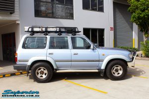 Right side view of a Blue Marlin Toyota 80 Series Landcruiser Wagon before fitment of a Superior Nitro Gas 2" Inch Lift Kit, Superior Radius Arm Rear Bushes & Superior Swaybar Extensions
