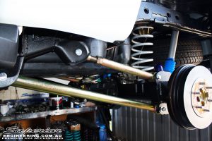 Mid left rear side shot of the fitted Superior Upper Adjustable Control Arms, Superior Lower Control Arms and Superior Coil Springs