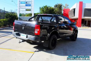 Rear right view of a Black Holden RG Colorado Dual Cab before fitment of a Superior Nitro Gas 2" Inch Lift Kit with King Coil Springs, Fuel Beast Wheels & Toyo Open Country Tyres