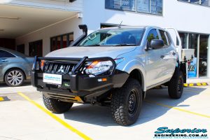 Left front side view of a Mitsubishi MQ Triton Dual Cab after fitment of a Ironman 4x4 Bullbar