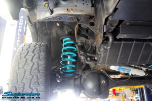 Front right underbody shot of the fitted Dobinson Coil Spring with Superior 2" Nitro Gas Shock