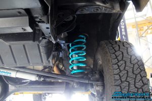 Front left underbody shot of the fitted Dobinson Coil Spring with Superior 2" Nitro Gas Shock