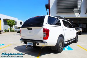 Rear right view of a Nissan NP300 Navara Dual Cab before fitment of a Bilstein 2" Inch Lift Kit with King Coil Springs