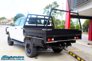 Rear left view of a White Toyota Revo Hilux Dual Cab after fitment of a Superior 4" Inch Lift Kit