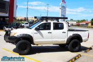 Left side view of a Toyota Vigo Hilux Dual Cab after fitment of a Superior Remote Reservoir 3" Inch Lift Kit with King Coil Springs & Superior Billet Alloy Upper Control Arms