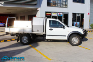 Right side view of a White Isuzu D-Max Single Cab before fitment of a EFS 40mm Lift Kit