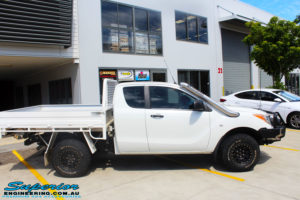Right side view of a Mazda BT50 in White before fitment of a Superior 3" Inch Remote Reservoir Lift Kit with Nitto Terra Grappler Tyres + ROH Black Steel Wheels