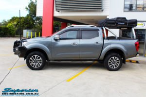 Left side view of a Nissan NP300 Navara Dual Cab before fitment of a 2" Inch Lift Kit