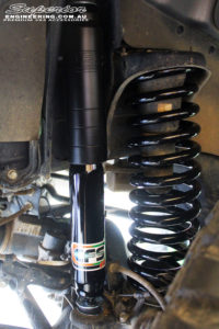 Front left close up guard view of the fitted EFS 2" Front Shock with EFS Coil Spring