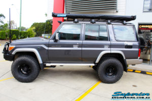 Left side view of a Toyota 76 Series Landcruiser Wagon in Grey before fitment of a EFS 2" Lift Kit