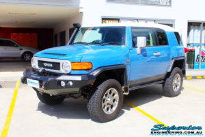Left front side view of a Toyota FJ Cruiser in Blue before fitment of a 2" Inch Lift Kit