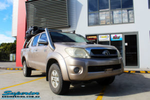 Right front side view of a Toyota Vigo Hilux Dual Cab before fitment of a Superior Nitro Gas 3" Inch Lift Kit