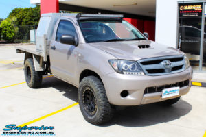 Right front side view of a Toyota Vigo Hilux Single Cab in Grey before fitment of a Superior Nitro Gas 2" Inch Lift Kit with King Coil Springs