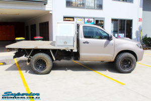 Right side view of a Toyota Vigo Hilux Single Cab in Grey before fitment of a Superior Nitro Gas 2" Inch Lift Kit with King Coil Springs