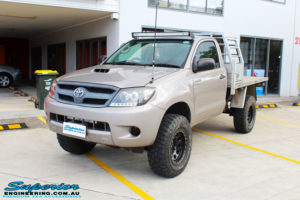 Right front side view of a Toyota Vigo Hilux Single Cab in Grey after fitment of a Superior Nitro Gas 2" Inch Lift Kit with King Coil Springs